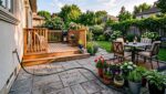 Homeowner Inspecting An Outdoor Tap And Garden Hose Before Summer Patio Season